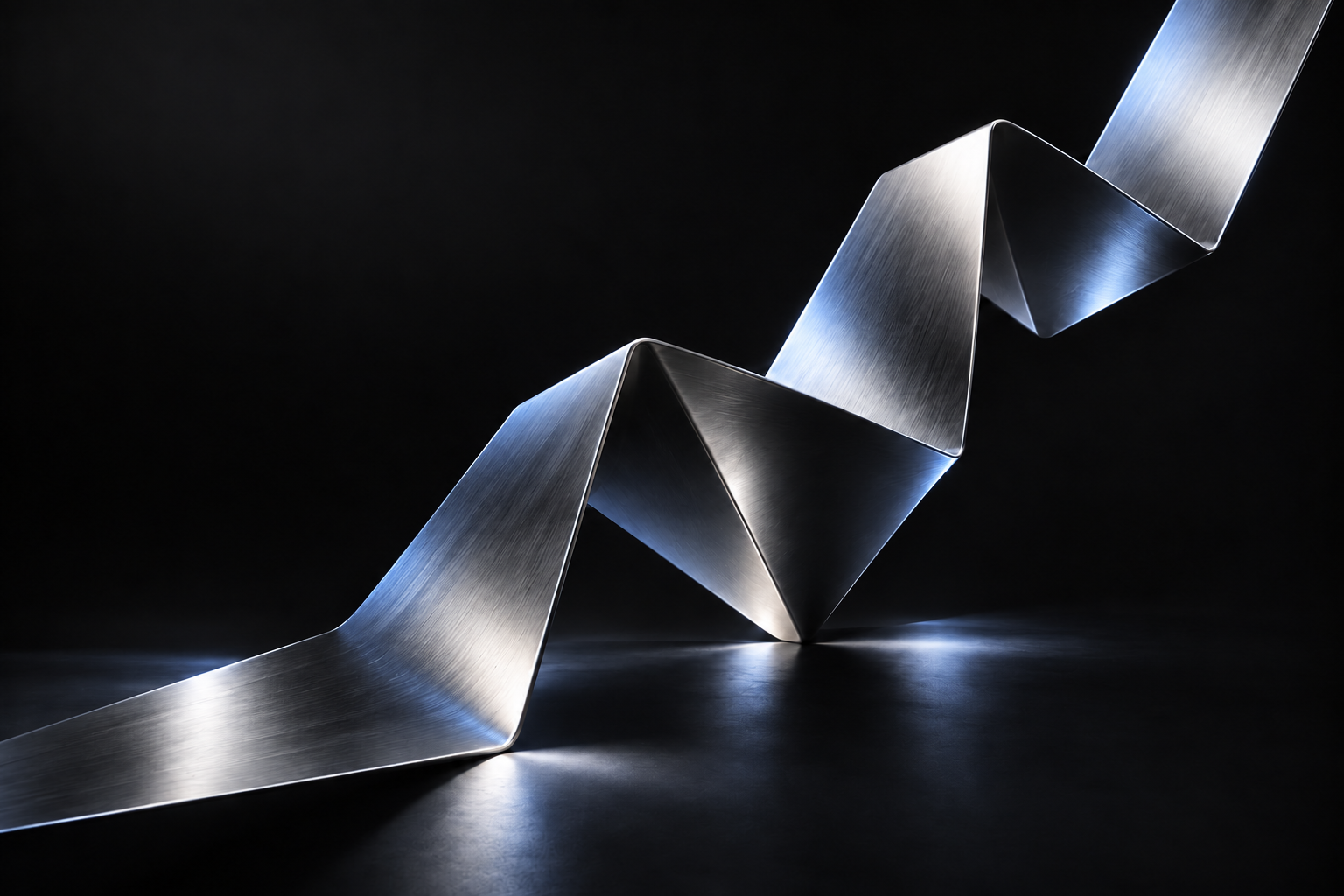 Ascending brushed chrome sculpture with icy blue reflections on a black background